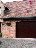 Porte de garage sectionnelle latérale