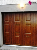 Porte de garage sectionnelle latérale