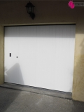 Porte de garage sectionnelle latérale