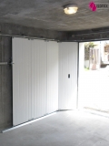 Porte de garage sectionnelle latérale